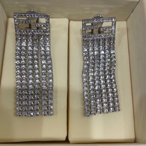 Brand new! Never worn Fendi tassel clip on earrings. Stunning and sparkling